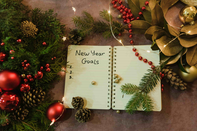 As we prepare to say goodbye to 2025, the University of Sunderland’s Dr Derek Watson, Associate Professor in Cultural Management, is exploring why we might struggle to stick to our New Year’s resolutions – from a cultural perspective – and what we can do to succeed. January 1 triggers many millions of people worldwide into what has been labelled the ‘fresh start effect’ to become a better person. Such a ritual can be traced back over 4,000 years to ancient Babylonians pledging to clear their debts. The reality is that most New Year’s resolutions such as being more careful with our spending, weight loss, positive health choices, increased family and relationship time fail to gain traction, and many are disbanded by February. It is true to say that New Year’s resolutions are as frangible as impulsive Trumpian commitments, wedding vows and Christmas baubles? Through no fault of our own, many play folly to the view that New Year’s resolutions, rather like weight loss are dependent on self-control and will power. It is in fact heavily reliant on one’s ability to change their bad habits which does not come easily. It is process of repeating conscious actions which transition into subconscious intent, often referred to as the ‘law of habituation’. An example of this is driving to work each day and you find yourself on occasions following the same route on a weekend in response to a cognitive lapse due to a lack of focus on the present. A part of the brain called the basal ganglia helps you form and keep habits. It is also the part that makes you react automatically to things you’ve learned. Whilst the cognition of goal formulation is stored within the brain’s frontal lobe, primarily the prefrontal cortex, the prefrontal cortex has the capacity to veto a newly formed conditioned response, but it is more challenging to overcome hardwired habits influenced by the basal ganglia. Bad habits are stealthily ingrained over many years of repeated actions and to irradicated and replace with desired positive habits requires the brain to receive an instant positive stimulus of dopamine, which reinforces the desire to repeat the action as there is a clear correlation between fluctuations of dopamine and motivation. Habit transformations which struggle to release dopamine starve the brain of its reward sensation i.e. motivation and significantly hinders the brains neuroplasticity in the subconscious adoption of positive habits. The decision to adopt New Year’s resolutions is a change process and requires time. For instance, to subconsciously adopt the habit of drinking a glass of warm water with lemon each morning takes approximately two months. It is therefore critical to identify and mitigate against any frictions which would hinder this transition. For example, Netflix have eased the decision-making option when watching their box sets, informing viewers that the next episode will start in nine seconds. Data also indicates that those who select gym memberships closest to their homes are more likely to be active members after three to four months. Whilst those who pen a shopping list avoid impulse purchases.